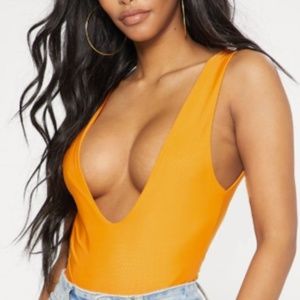 Orange bodysuit